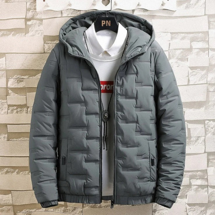 Men's waterproof padded jacket with insulated warmth, breathable design, and weather-resistant fabric for autumn days.
