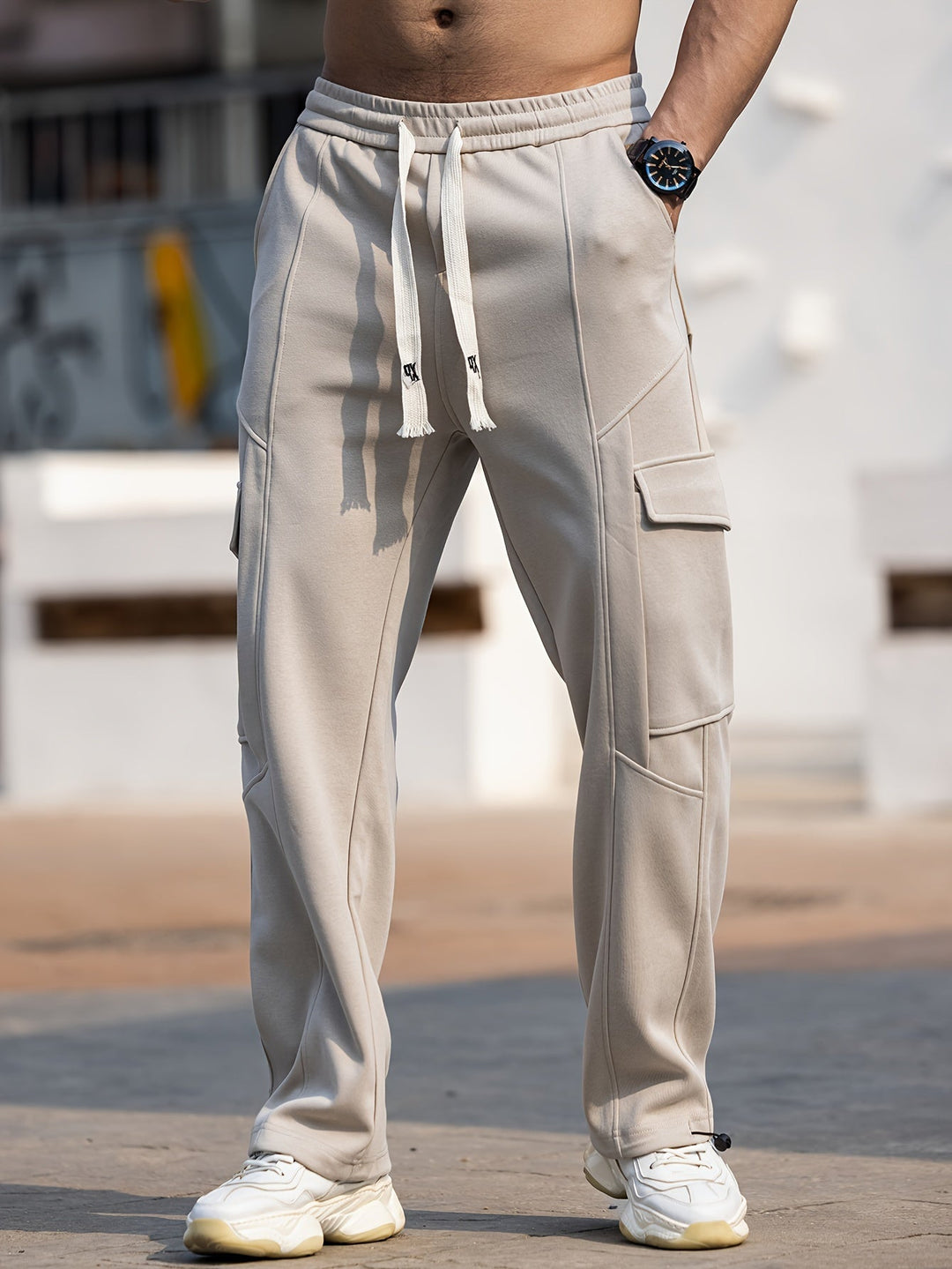 Modern multi-pocket summer pants for men with breathable fabric and functional storage, ideal for warm-weather comfort and style.
