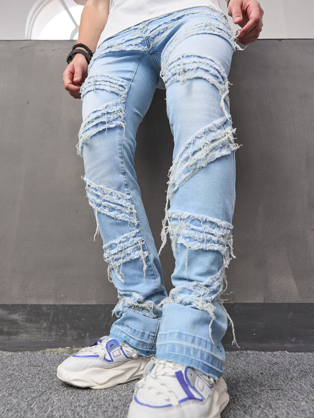 Premium men's bootcut jeans with a breathable, lightweight denim design for stylish summer comfort.