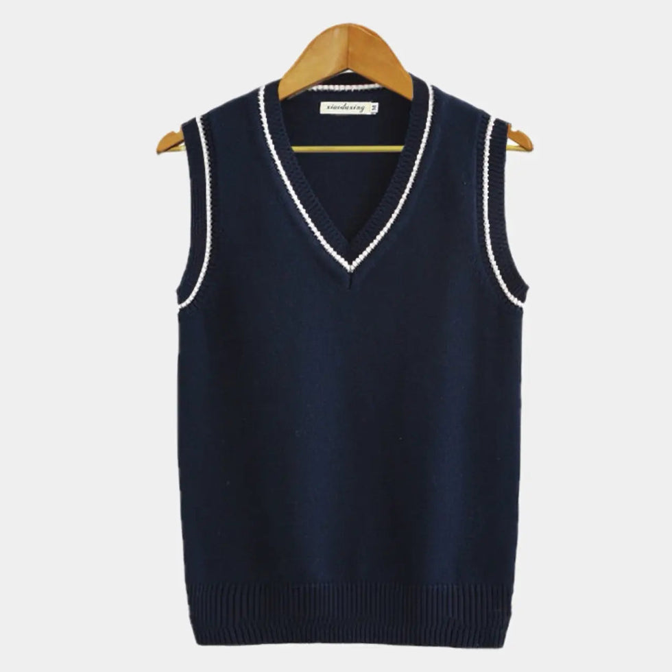 Elegant sleeveless sweater for men with soft knit texture and tailored fit, perfect for layering on Autumn days.