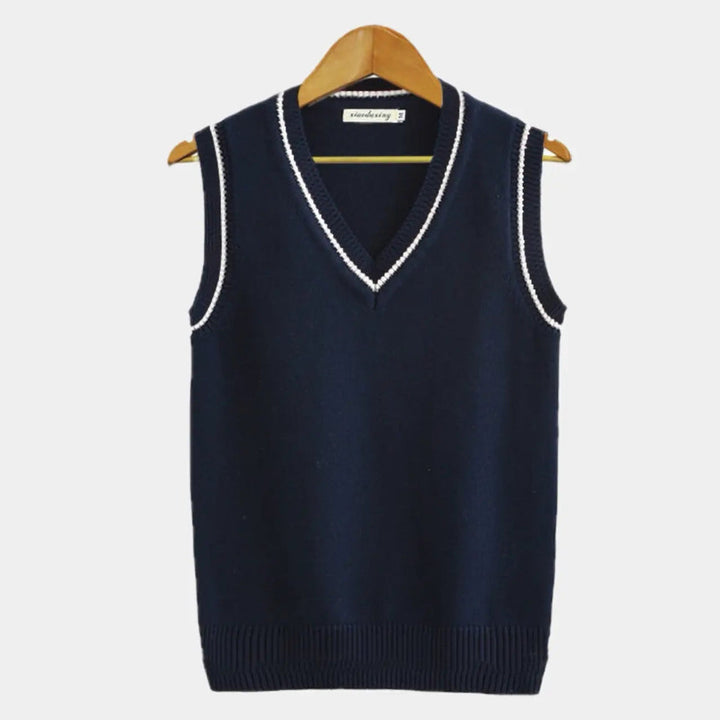 Elegant sleeveless sweater for men with soft knit texture and tailored fit, perfect for layering on Autumn days.