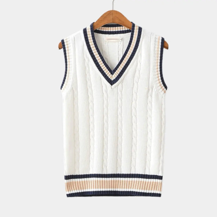 Elegant sleeveless sweater for men with soft knit texture and tailored fit, perfect for layering on Autumn days.