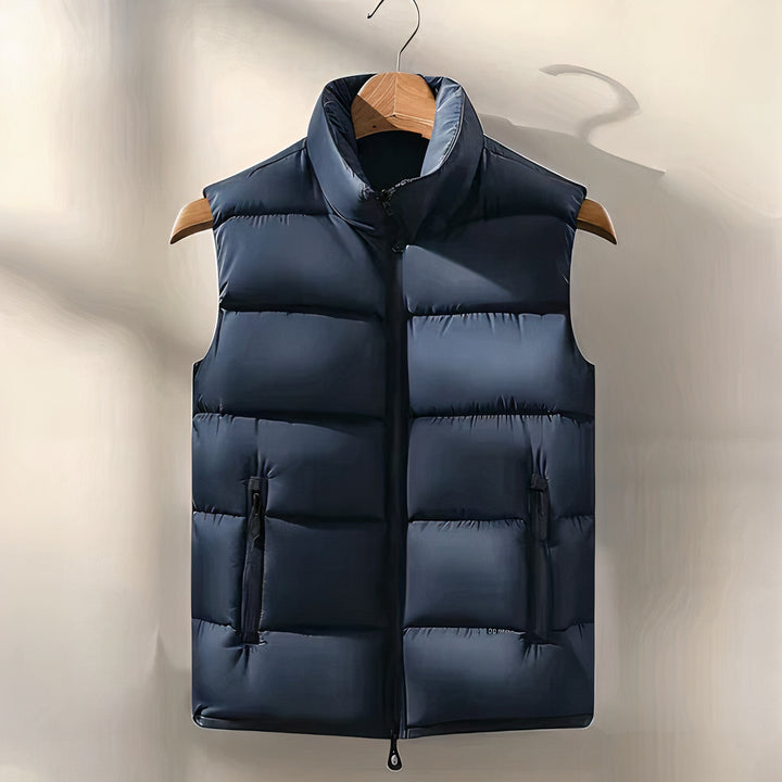 Warm men's sleeveless padded vest with breathable insulation, perfect for Autumn layering.








