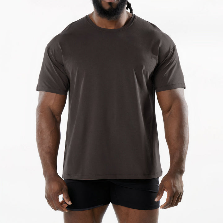 Basic summer t-shirt for men with breathable, lightweight fabric, offering comfort and effortless style for warm days.








