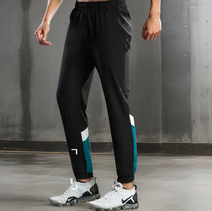 Breathable men's summer pants with a lightweight fabric and relaxed fit, ideal for keeping cool and stylish on warm days.