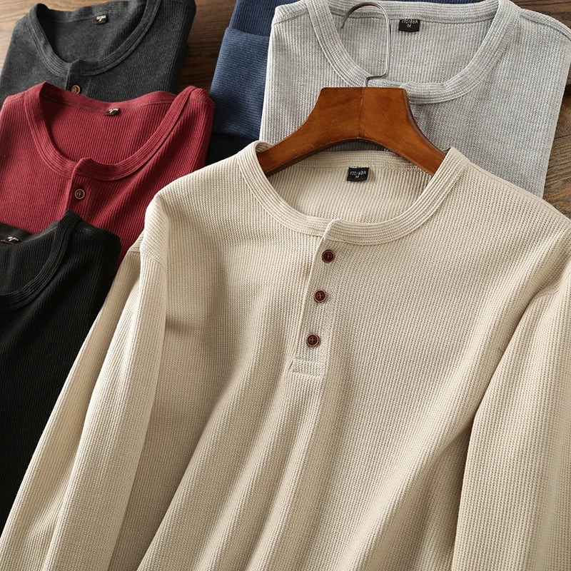 Casual long-sleeve Henley shirt offering a breathable and comfortable design.