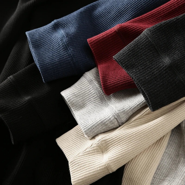 Casual long-sleeve Henley shirt offering a breathable and comfortable design.