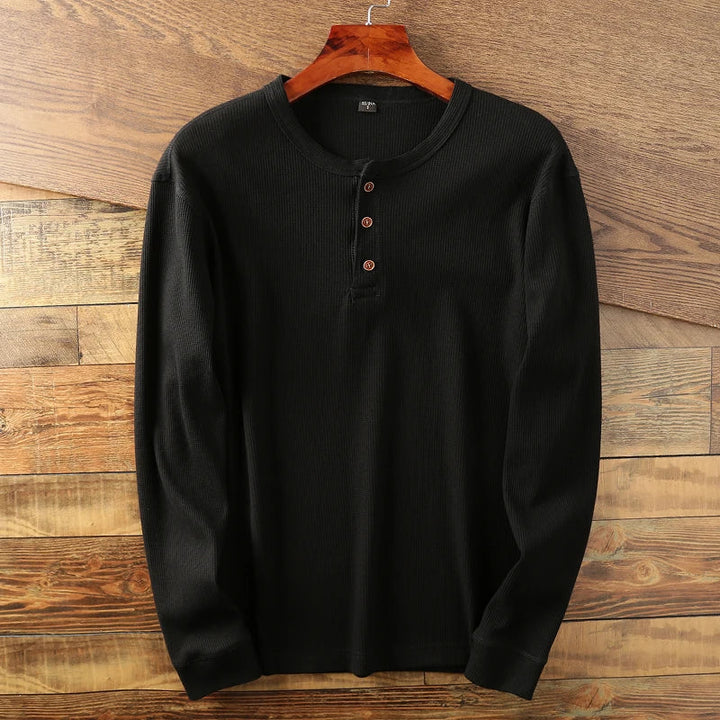 Casual long-sleeve Henley shirt offering a breathable and comfortable design, perfect for summer days.