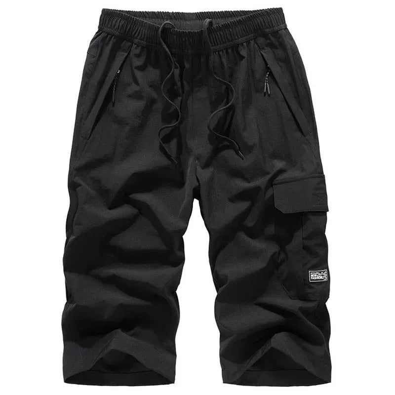 Casual sporty shorts for men with breathable fabric and a stretchy waistband—ideal for active summer days and casual wear.