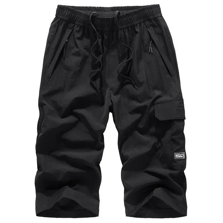 Casual sporty shorts for men with breathable fabric and a stretchy waistband—ideal for active summer days and casual wear.