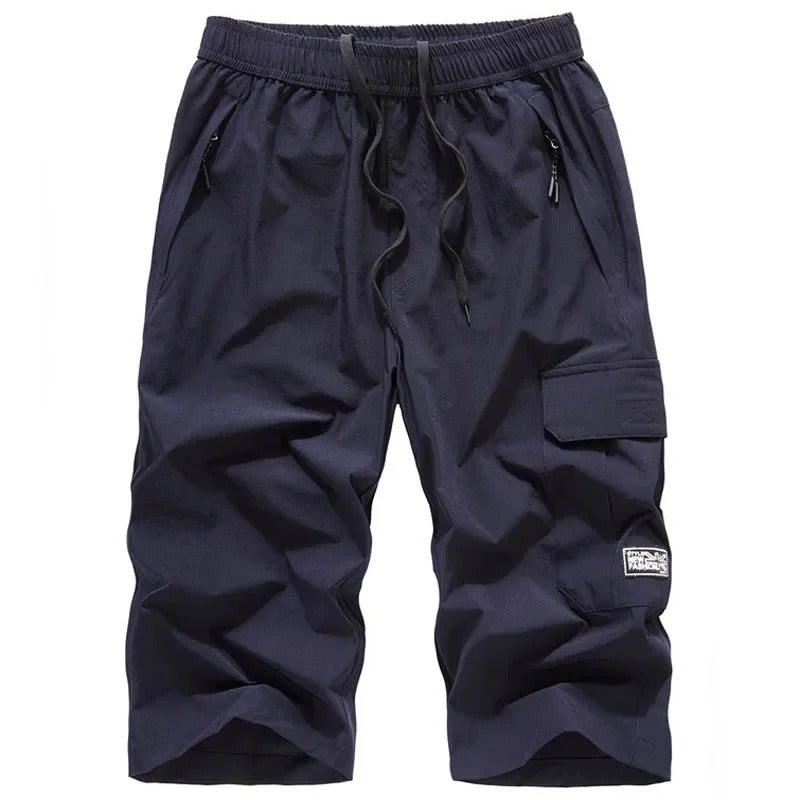 Casual sporty shorts for men with breathable fabric and a stretchy waistband—ideal for active summer days and casual wear.
