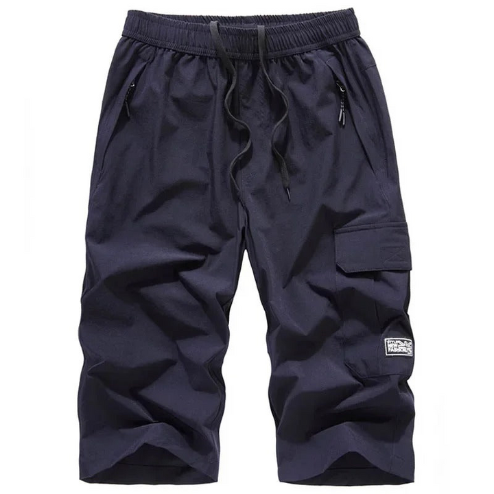 Casual sporty shorts for men with breathable fabric and a stretchy waistband—ideal for active summer days and casual wear.