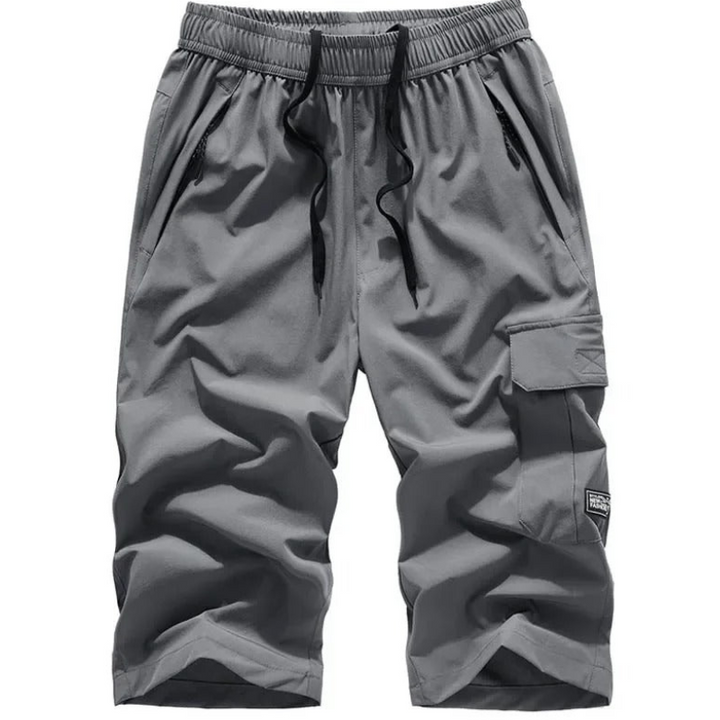 Casual sporty shorts for men with breathable fabric and a stretchy waistband—ideal for active summer days and casual wear.
