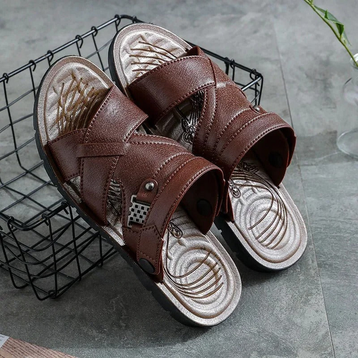 Man wearing casual walking sandals, perfect for light, comfortable steps on warm summer days.








