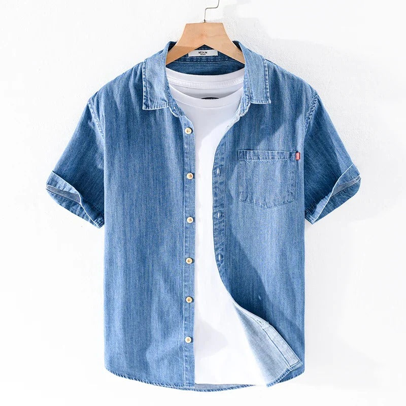 Classic denim summer shirt for men with breathable, lightweight fabric and a stylish, versatile design.