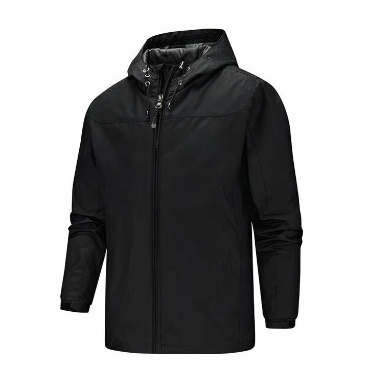 Men's classic hooded rain jacket, waterproof and windproof, ideal for autumn days.







