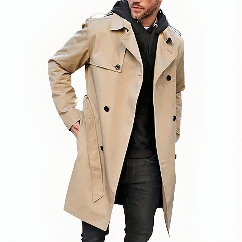 Man wearing a classic trench coat, ideal for autumn days and sophisticated everyday wear.








