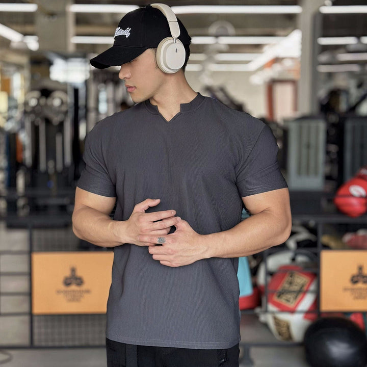 Classic V-neck summer shirt for men, lightweight and breathable for warm weather comfort.