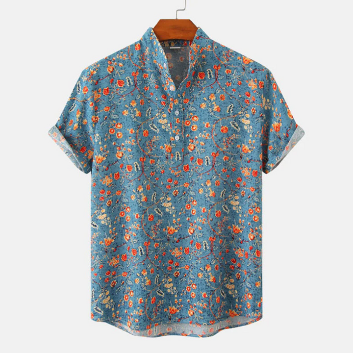 Colorful floral summer shirt for men, perfect for casual and beach settings.