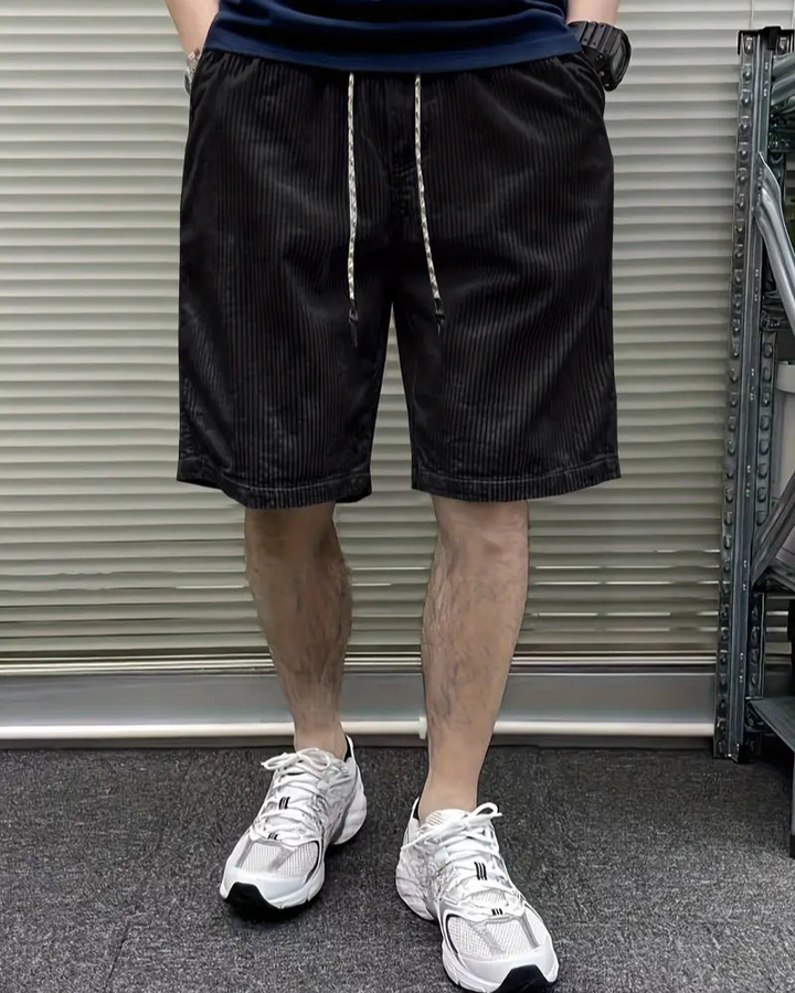 Elegant corduroy cargo shorts for men with soft fabric, multiple pockets, and a relaxed fit—perfect for stylish and comfortable summer days.