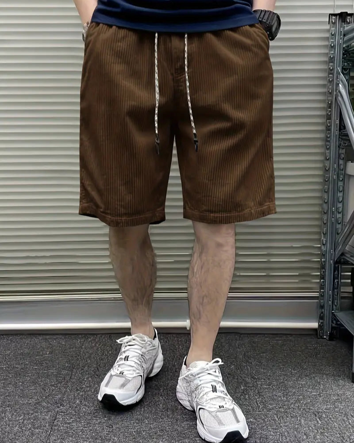Elegant corduroy cargo shorts for men with soft fabric, multiple pockets, and a relaxed fit—perfect for stylish and comfortable summer days.
