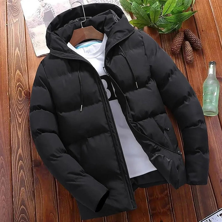 Elegant hooded quilted coat for men with premium insulation, wind protection, and a stylish design for autumn days.