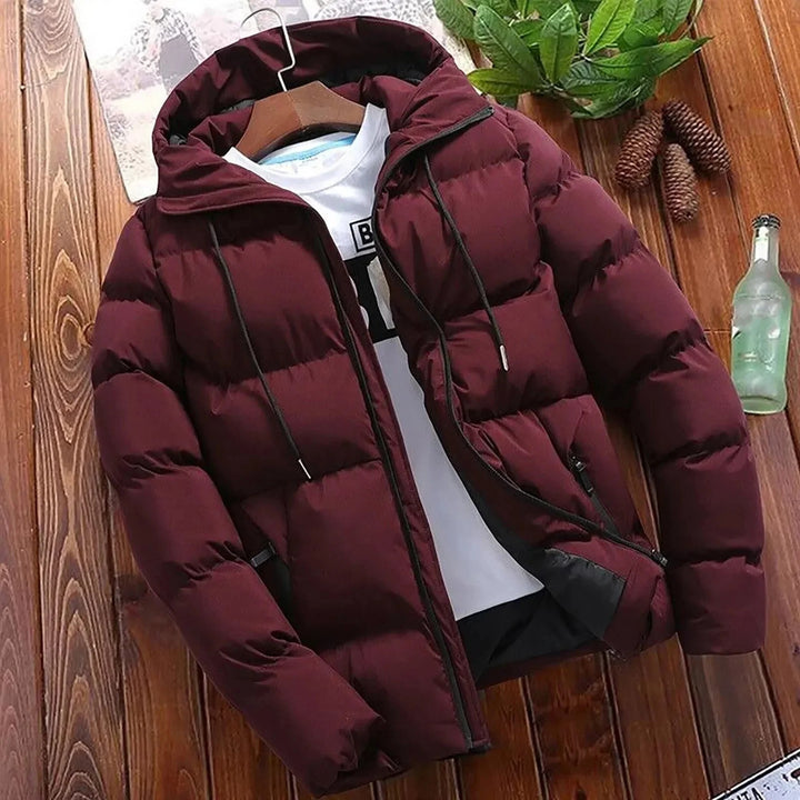 Elegant hooded quilted coat for men with premium insulation, wind protection, and a stylish design for autumn days.