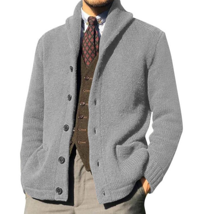 Men’s elegant knitted jacket with tailored fit and soft texture, perfect for comfort and style on autumn days.









