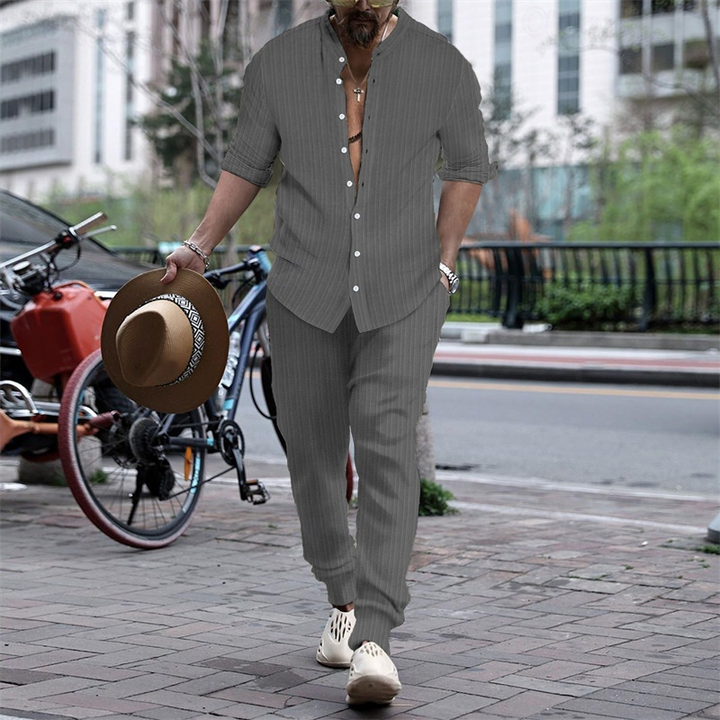 Elegant shirt and pants set for men with lightweight breathable fabric, perfect for stylish summer days.








