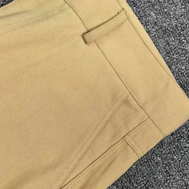 Luxe multi-pocket summer cargo shorts with a tailored fit, breathable fabric, and durable design, perfect for casual and outdoor activities on summer days.