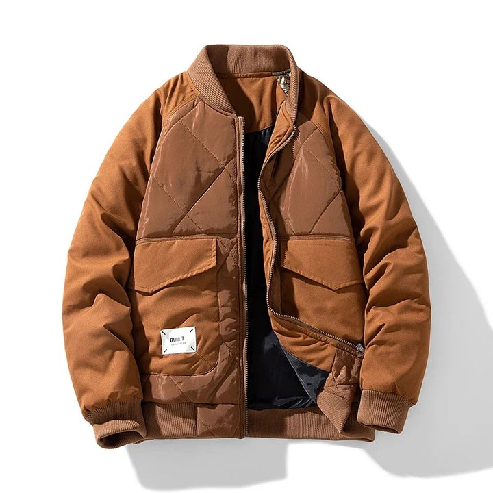 Men's durable quilted bomber jacket with lightweight warmth, ideal for autumn days.







