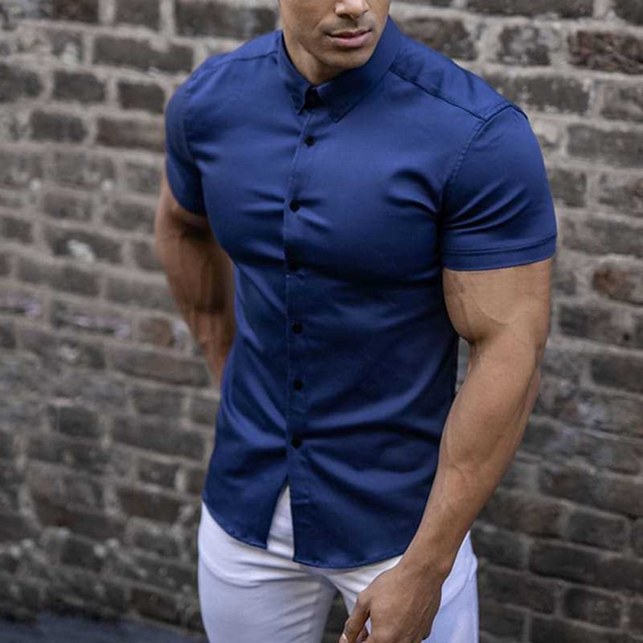 Men's elegant button-down summer shirt, breathable and stylish for warm weather comfort.








