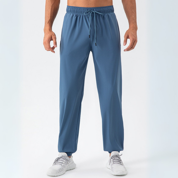 Men's lightweight casual summer pants with breathable fabric, designed for cool and comfortable warm-weather wear.
