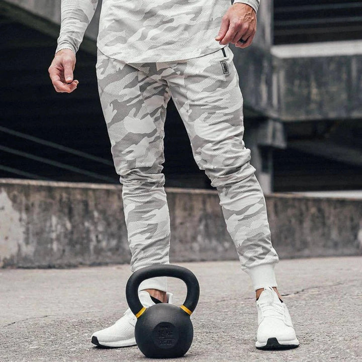 Men's trendy camouflage cotton pants with a breathable fabric and relaxed fit, ideal for outdoor adventures and casual summer days.








