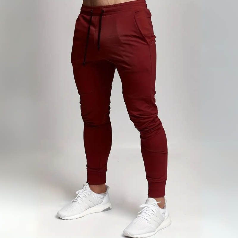 Men’s trendy slim-fit sweatpants with breathable fabric, elastic waistband, and versatile style, perfect for casual  wear.