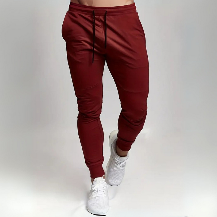 Men’s trendy slim-fit sweatpants with breathable fabric, elastic waistband, and versatile style, perfect for casual  wear.