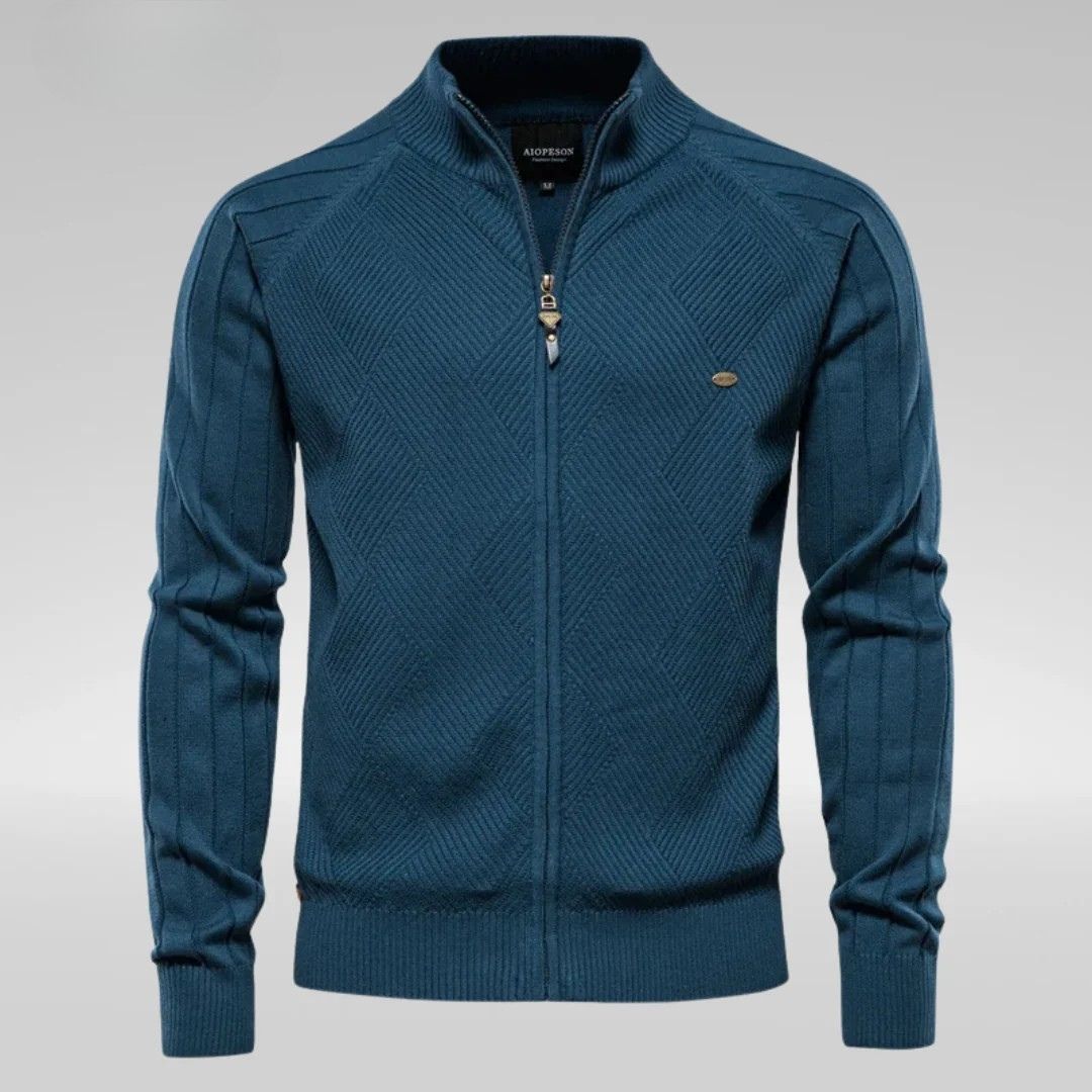 Men's streetwear-style knitted sweater with bold front lettering, featuring a relaxed fit and ribbed cuffs.