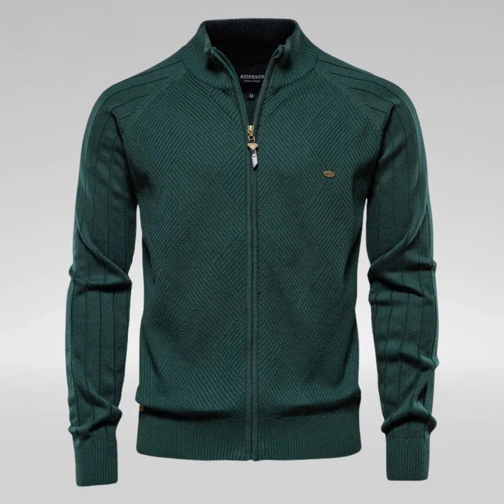 Men's streetwear-style knitted sweater with bold front lettering, featuring a relaxed fit and ribbed cuffs.