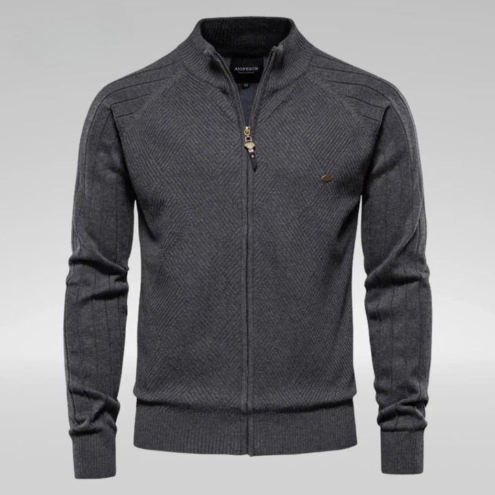 Men's streetwear-style knitted sweater with bold front lettering, featuring a relaxed fit and ribbed cuffs.