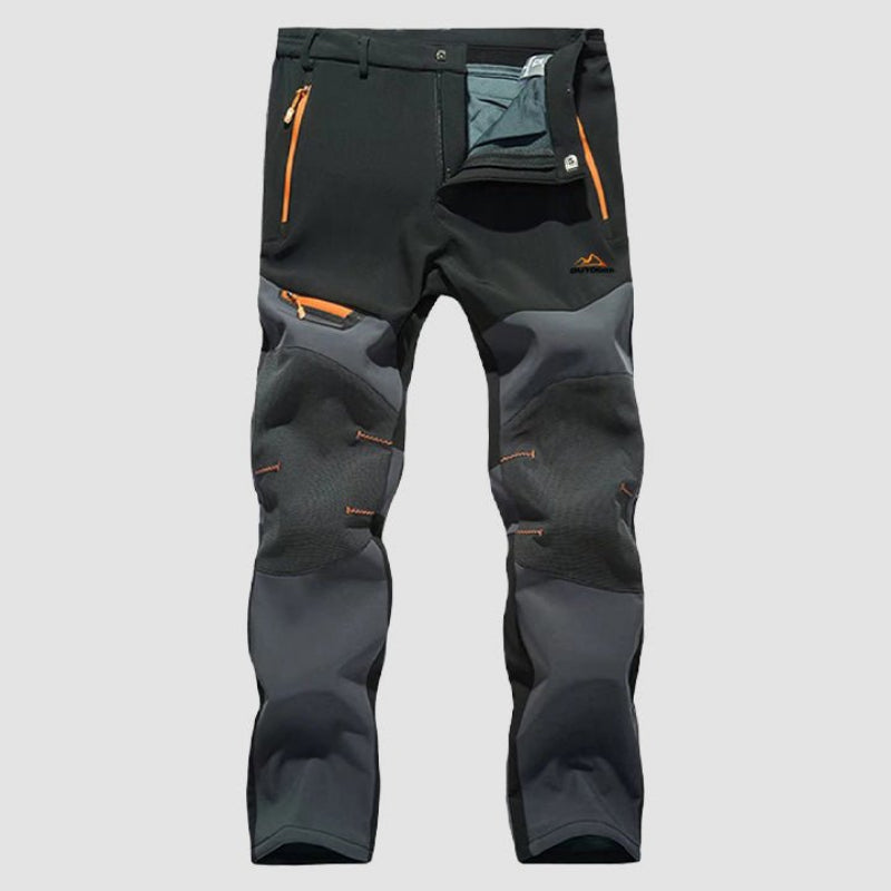 Men's waterproof work pants with reinforced durability, flexible fit, and multiple pockets, ideal for outdoor work and autumn days.







