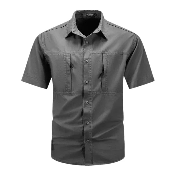 Men's stylish cargo summer shirt with breathable fabric, functional pockets, and a lightweight design for warm days.