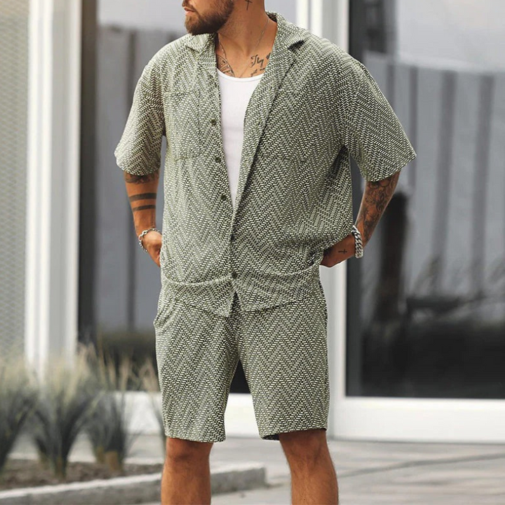Stylish men's polo shirt and shorts set for summer, featuring breathable fabric and a modern design ideal for warm-weather days.
