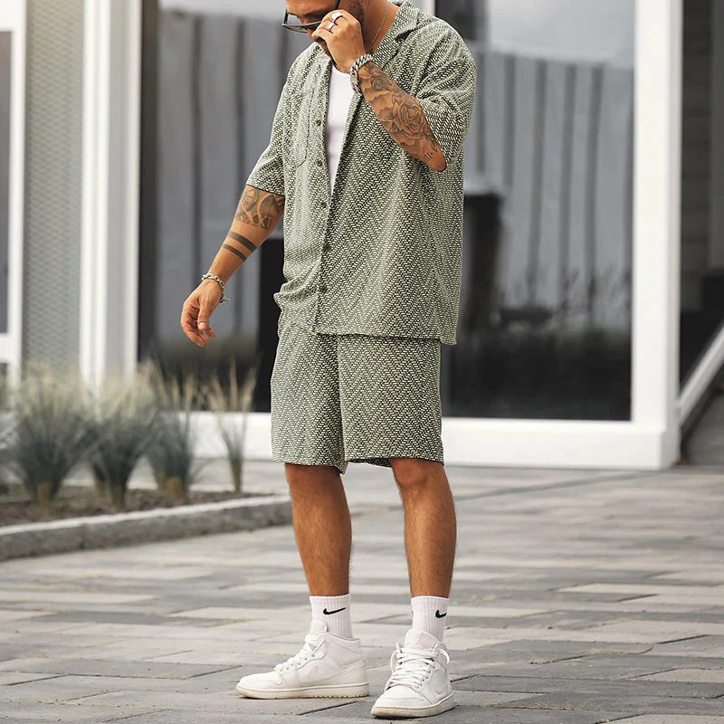 Stylish men's polo shirt and shorts set for summer, featuring breathable fabric and a modern design ideal for warm-weather days.

