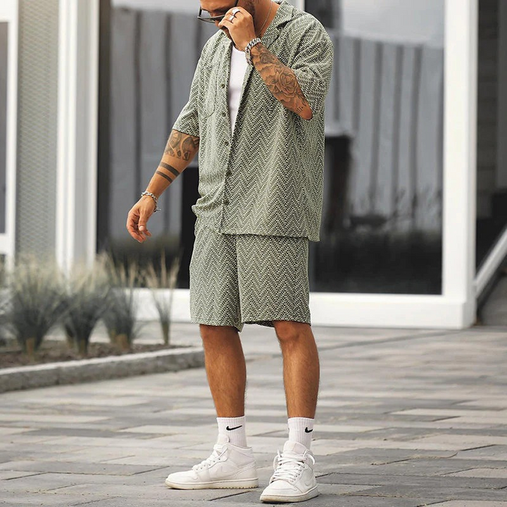 Stylish men's polo shirt and shorts set for summer, featuring breathable fabric and a modern design ideal for warm-weather days.
