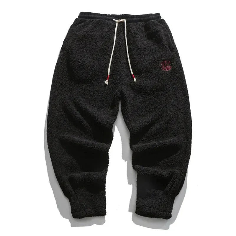 Stylish fleece joggers for men with a modern fit, soft fabric, and adjustable waistband, ideal for cozy comfort and casual outings.