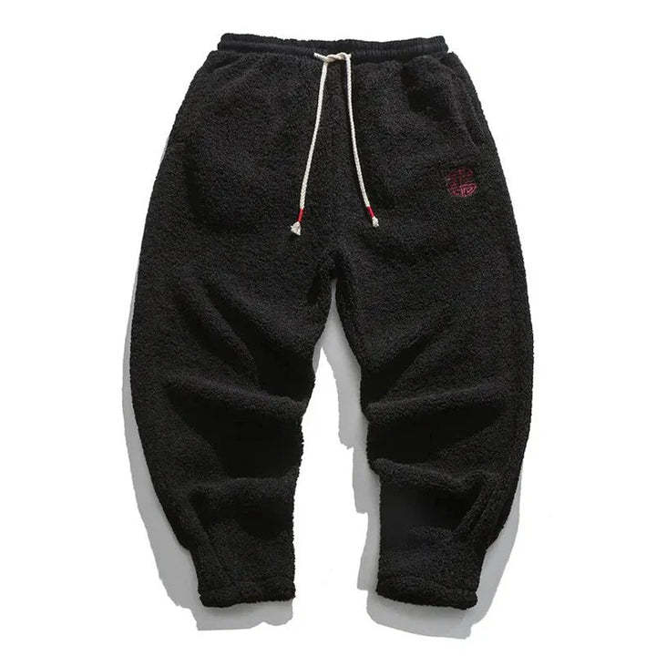 Stylish fleece joggers for men with a modern fit, soft fabric, and adjustable waistband, ideal for cozy comfort and casual outings.