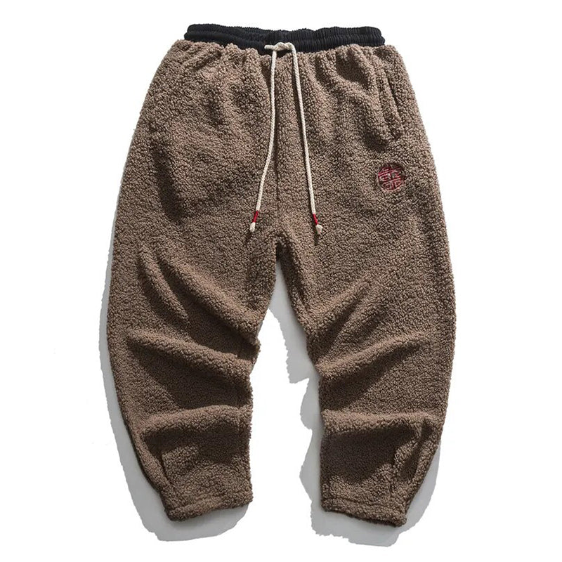 Stylish fleece joggers for men with a modern fit, soft fabric, and adjustable waistband, ideal for cozy comfort and casual outings.