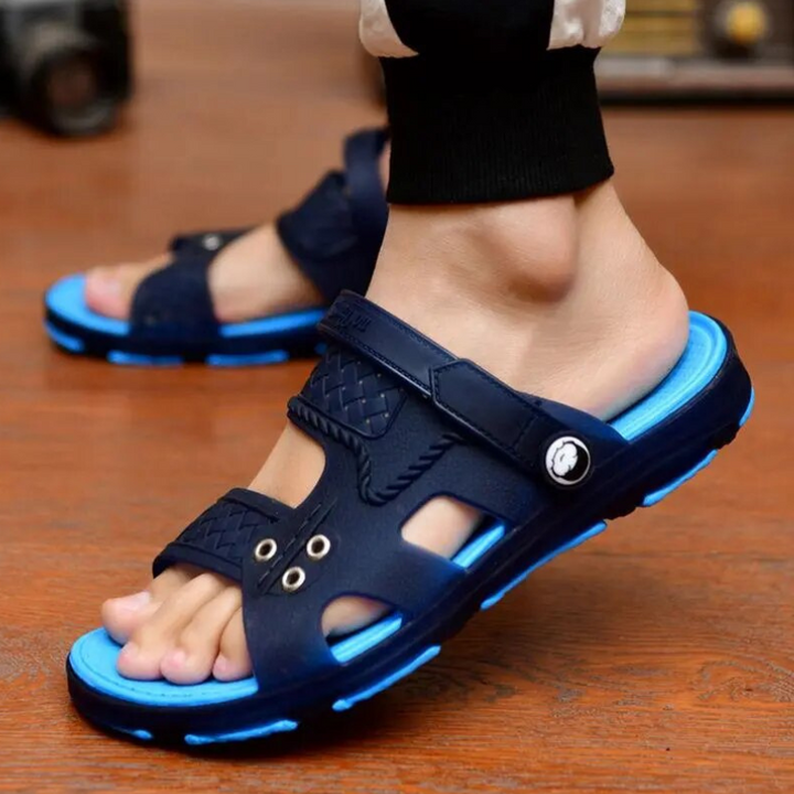 Supportive outdoor men's sandals offering stability, breathability, and comfort for summer adventures.








