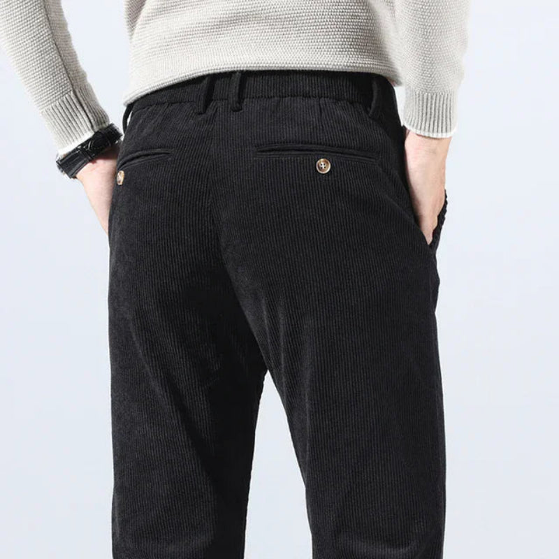 Men's tailored corduroy trousers featuring a modern fit, soft premium fabric, and versatile design, ideal for any occasion.
