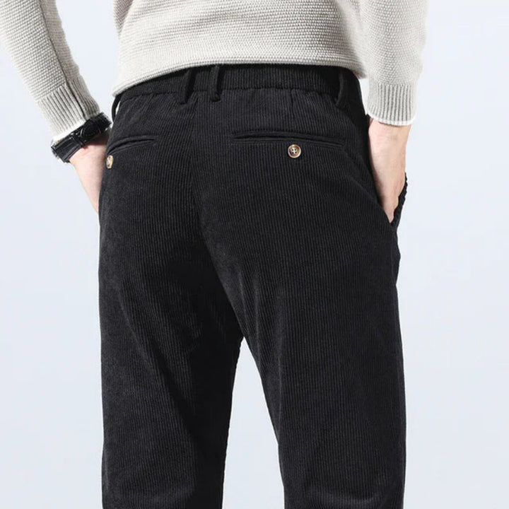 Men's tailored corduroy trousers featuring a modern fit, soft premium fabric, and versatile design, ideal for any occasion.